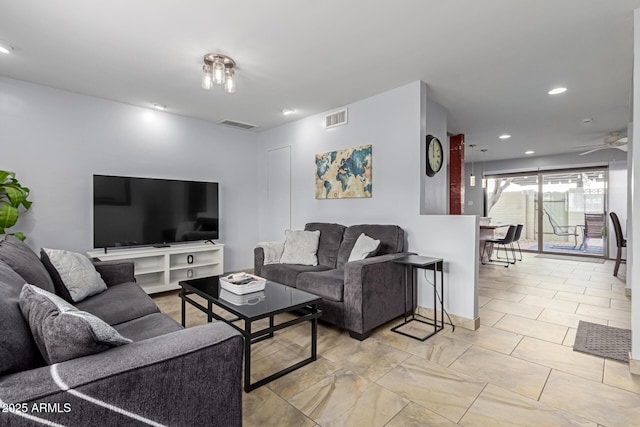 living area featuring a ceiling fan, visible vents, and recessed lighting