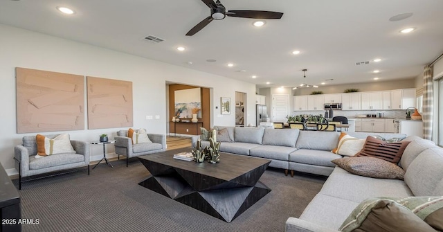 living room with ceiling fan