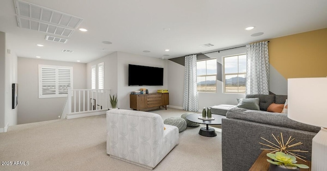 living room featuring light carpet