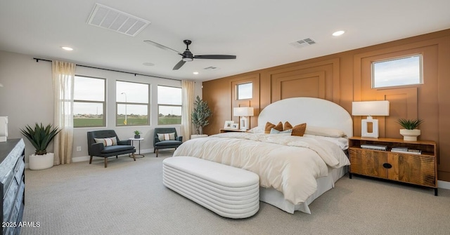 bedroom with ceiling fan and carpet