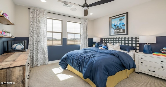 carpeted bedroom featuring ceiling fan