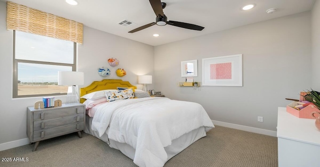 carpeted bedroom with ceiling fan