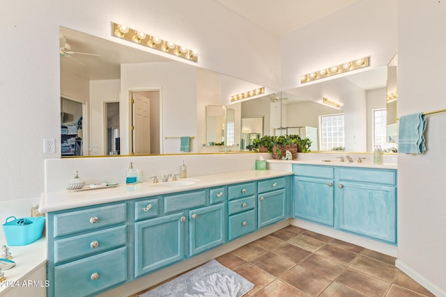 bathroom featuring vanity, ceiling fan, and tile patterned flooring