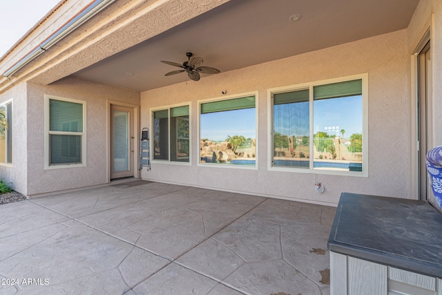 view of patio / terrace with ceiling fan