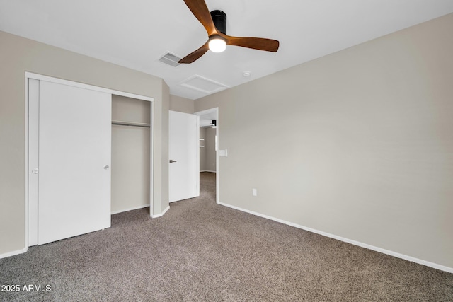 unfurnished bedroom featuring visible vents, baseboards, ceiling fan, carpet floors, and a closet