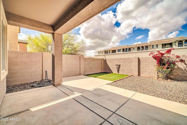 view of patio featuring a fenced backyard