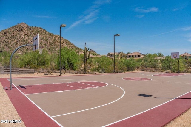 view of basketball court featuring community basketball court and a mountain view