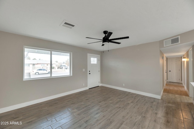 interior space featuring hardwood / wood-style flooring and ceiling fan