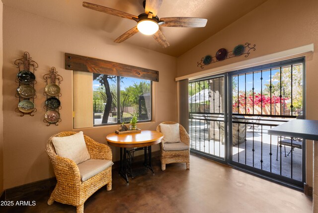 2311 W Dobbins Rd, Phoenix, AZ 85041 - sitting room featuring finished concrete flooring, ceiling fan, and vaulted ceiling