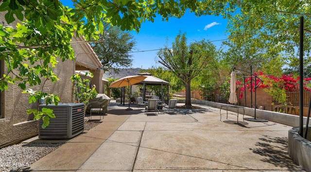 2311 W Dobbins Rd, Phoenix, AZ 85041 - view of patio / terrace with a gazebo, cooling unit, and a fenced backyard