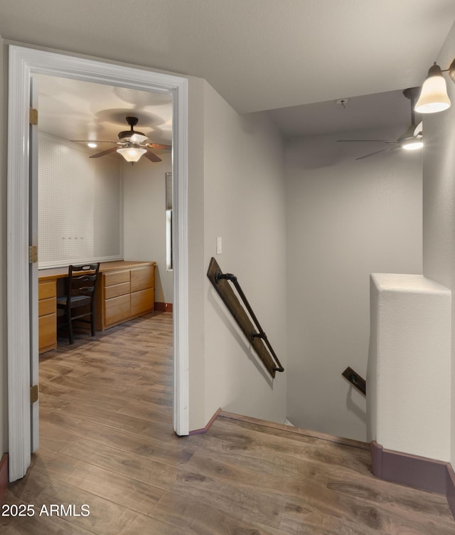 2311 W Dobbins Rd, Phoenix, AZ 85041 - staircase with ceiling fan and wood finished floors