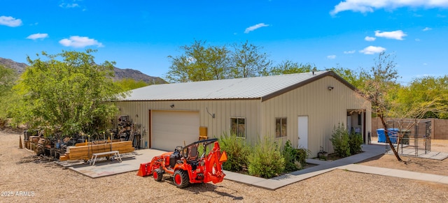 2311 W Dobbins Rd, Phoenix, AZ 85041 - garage featuring a mountain view and fence