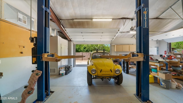 2311 W Dobbins Rd, Phoenix, AZ 85041 - garage featuring a workshop area