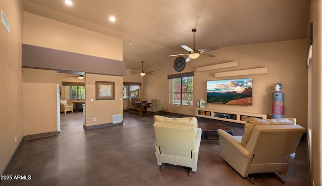 2311 W Dobbins Rd, Phoenix, AZ 85041 - living area with baseboards, ceiling fan, healthy amount of natural light, concrete flooring, and recessed lighting