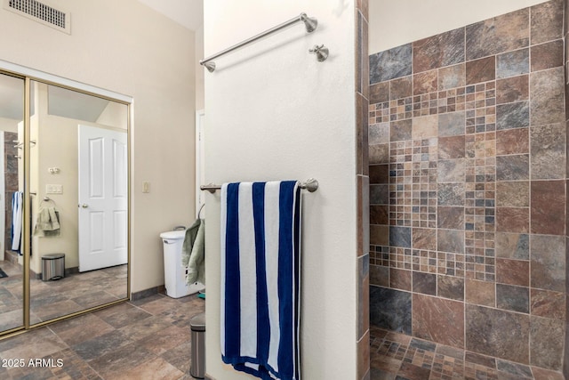 19029 N 36th St, Phoenix, AZ 85050 - full bath featuring a tile shower and stone finish floors