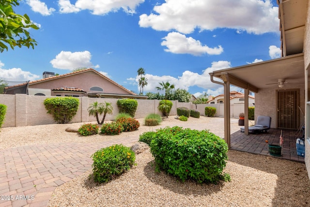 19029 N 36th St, Phoenix, AZ 85050 - fenced backyard with ceiling fan and a patio