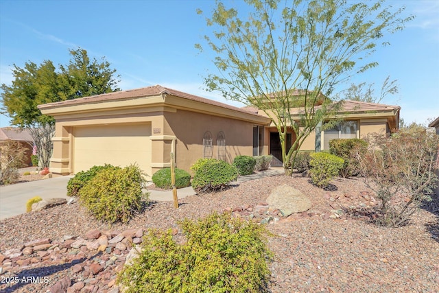 ranch-style house featuring a garage