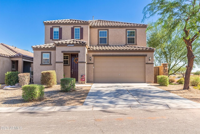 mediterranean / spanish-style house featuring a garage