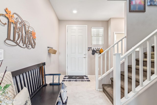 entryway with tile patterned floors