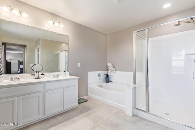 bathroom with vanity, tile patterned floors, and separate shower and tub