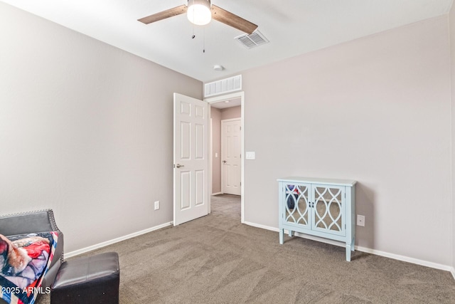 unfurnished room with carpet and ceiling fan