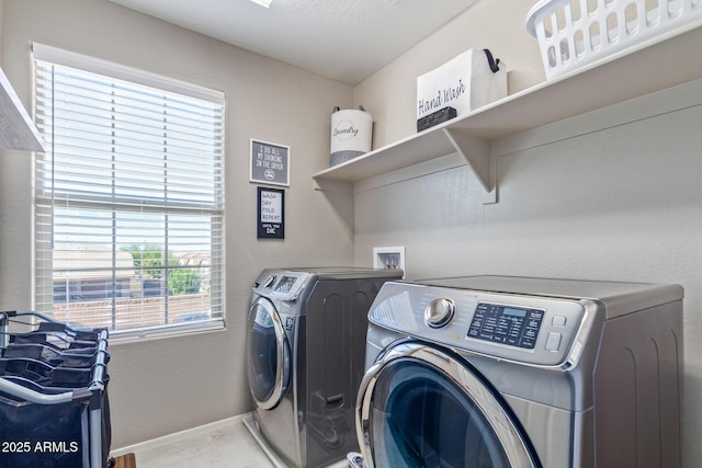 laundry area featuring washing machine and dryer