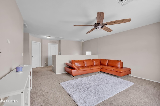 2198 W Pima Ave, Coolidge, AZ 85128 - living area with light colored carpet, attic access, and a ceiling fan