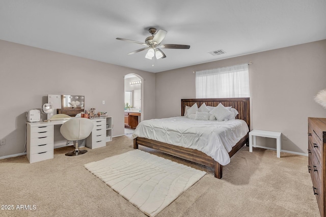2198 W Pima Ave, Coolidge, AZ 85128 - bedroom featuring light carpet, arched walkways, and multiple windows
