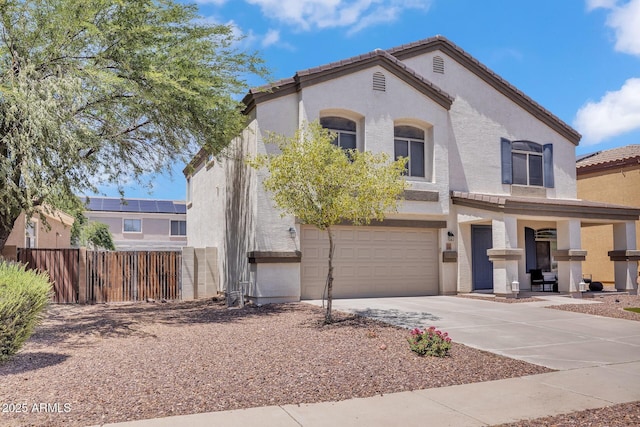 2198 W Pima Ave, Coolidge, AZ 85128 - mediterranean / spanish house with an attached garage, stucco siding, and driveway