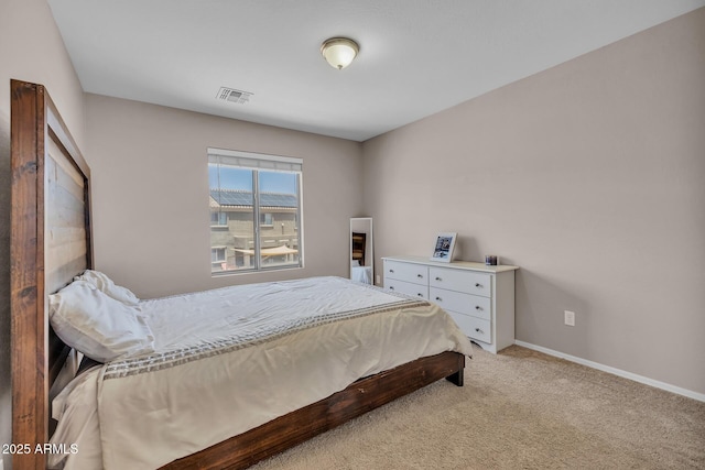 2198 W Pima Ave, Coolidge, AZ 85128 - bedroom featuring light carpet and baseboards