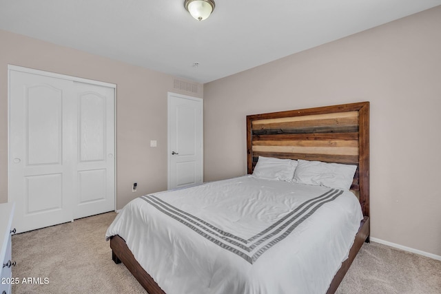 2198 W Pima Ave, Coolidge, AZ 85128 - carpeted bedroom with baseboards and a closet