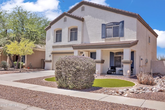 2198 W Pima Ave, Coolidge, AZ 85128 - view of front of home with a garage, stucco siding, and covered porch