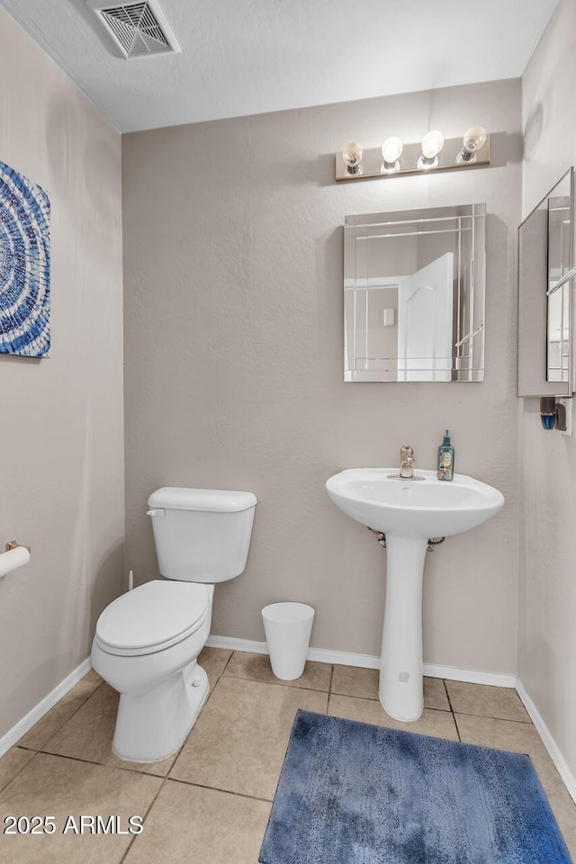 2198 W Pima Ave, Coolidge, AZ 85128 - bathroom featuring toilet and tile patterned flooring