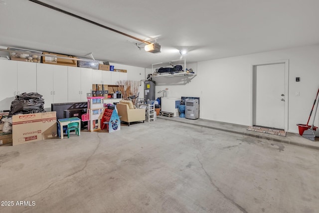 2198 W Pima Ave, Coolidge, AZ 85128 - garage with a garage door opener and water heater