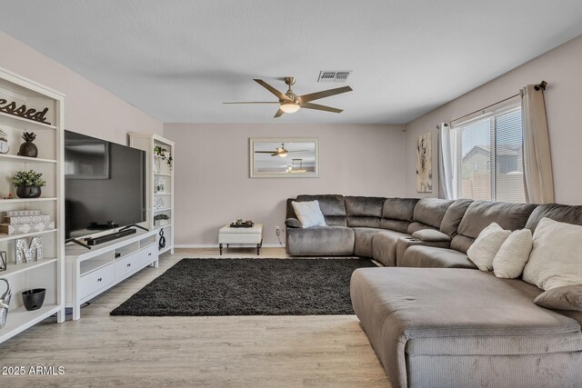 2198 W Pima Ave, Coolidge, AZ 85128 - living area with ceiling fan and wood finished floors