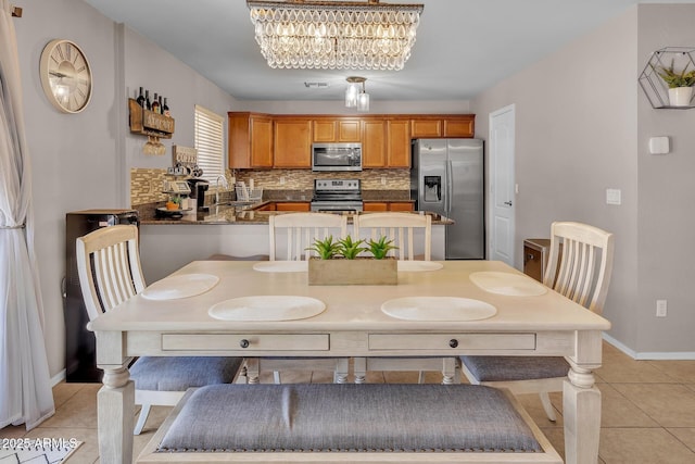 2198 W Pima Ave, Coolidge, AZ 85128 - dining area featuring light tile patterned floors and baseboards