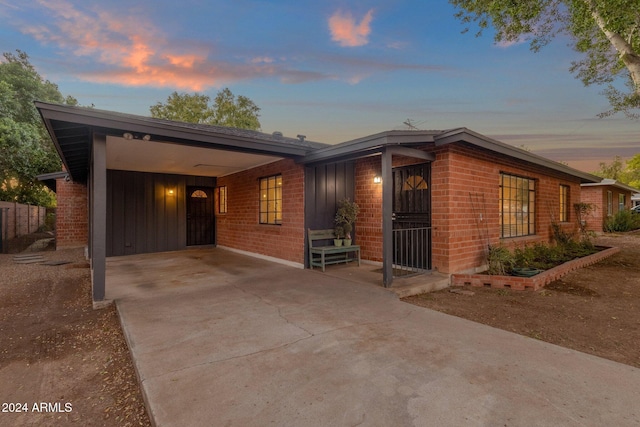 view of front facade featuring a carport