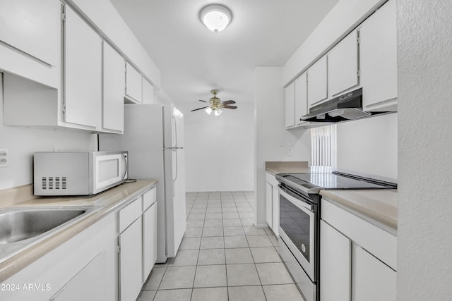 kitchen with white appliances, ceiling fan, sink, white cabinets, and light tile patterned flooring