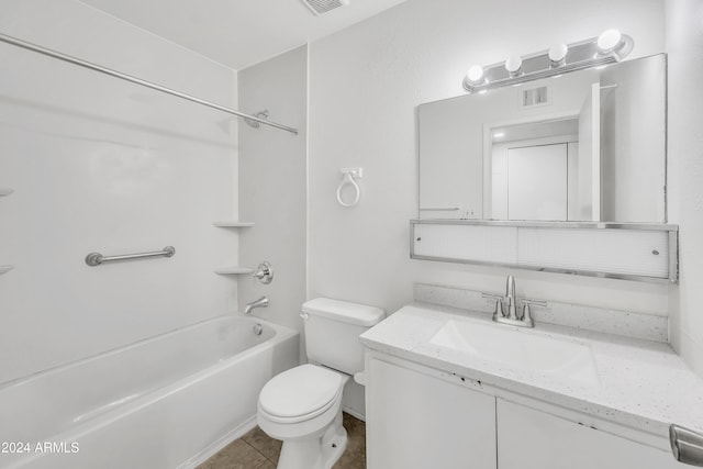 full bathroom with tile patterned floors, vanity, toilet, and washtub / shower combination