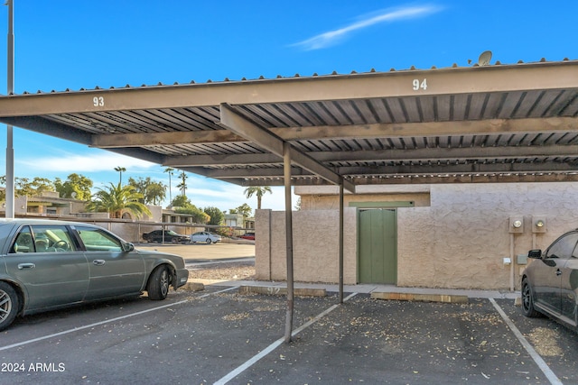 view of car parking featuring a carport