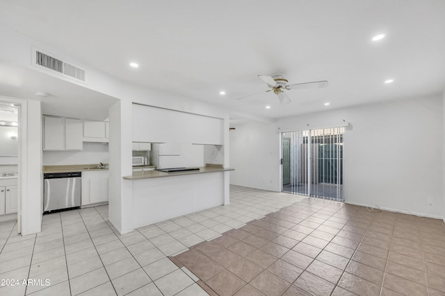 kitchen featuring white cabinetry, dishwasher, ceiling fan, kitchen peninsula, and light tile patterned floors