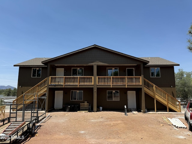 200 E Jura Cir, Payson, AZ 85541 - back of property featuring stairs, a wooden deck, and roof with shingles
