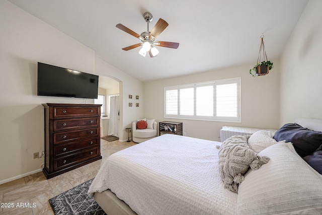 4558 E Libby St, Phoenix, AZ 85032 - bedroom featuring vaulted ceiling, arched walkways, baseboards, and ceiling fan