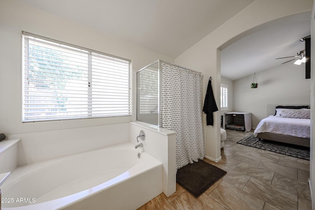 4558 E Libby St, Phoenix, AZ 85032 - bathroom with ceiling fan, a shower stall, a garden tub, and ensuite bath