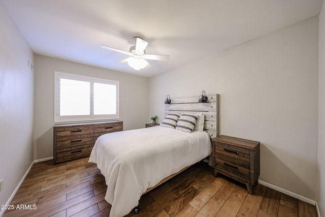 4558 E Libby St, Phoenix, AZ 85032 - bedroom featuring wood finished floors, baseboards, and a ceiling fan