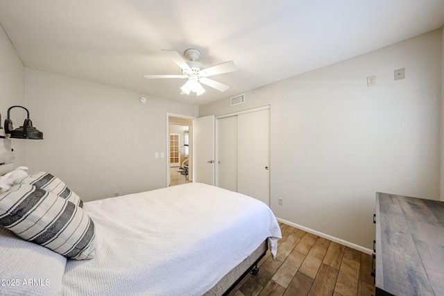 4558 E Libby St, Phoenix, AZ 85032 - bedroom with wood finished floors, baseboards, a closet, and ceiling fan