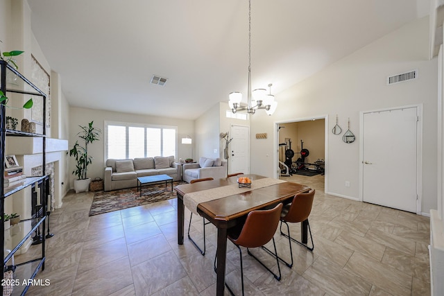 4558 E Libby St, Phoenix, AZ 85032 - dining room featuring a chandelier and high vaulted ceiling