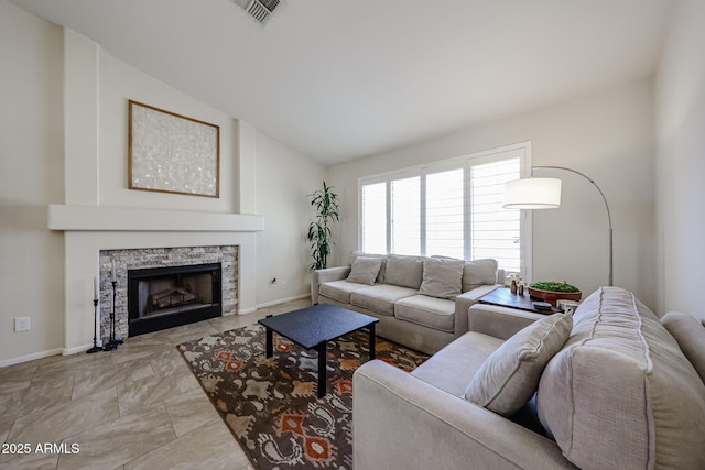 4558 E Libby St, Phoenix, AZ 85032 - living room featuring baseboards, a fireplace, and vaulted ceiling