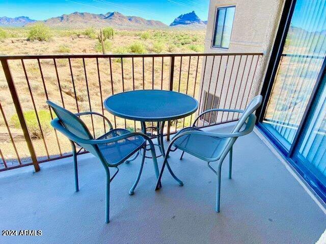 balcony featuring a mountain view