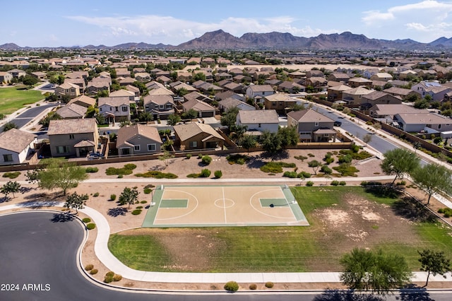 birds eye view of property with a residential view and a mountain view